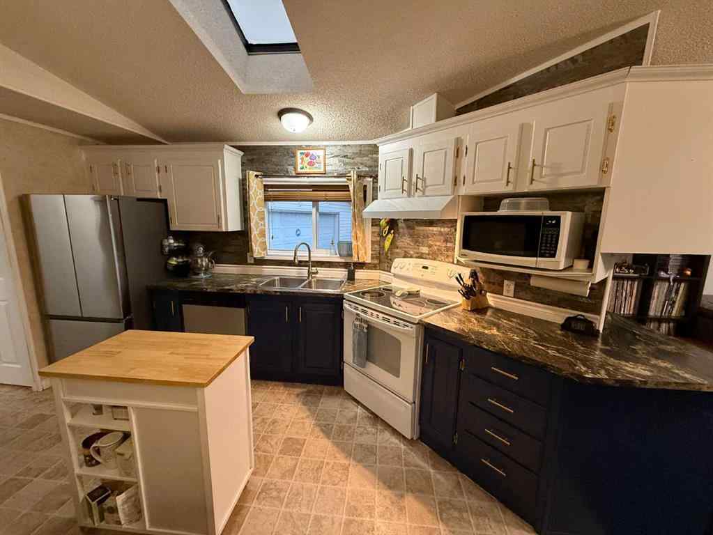 MLS&reg; # A2271022 - 122 Litke Cove  in Hardisty Hinton, Residential Open Houses