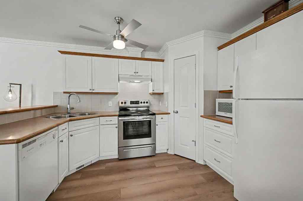 MLS&reg; # A2271045 - 1409 Strathcona Way  in Strathaven Strathmore, Residential Open Houses