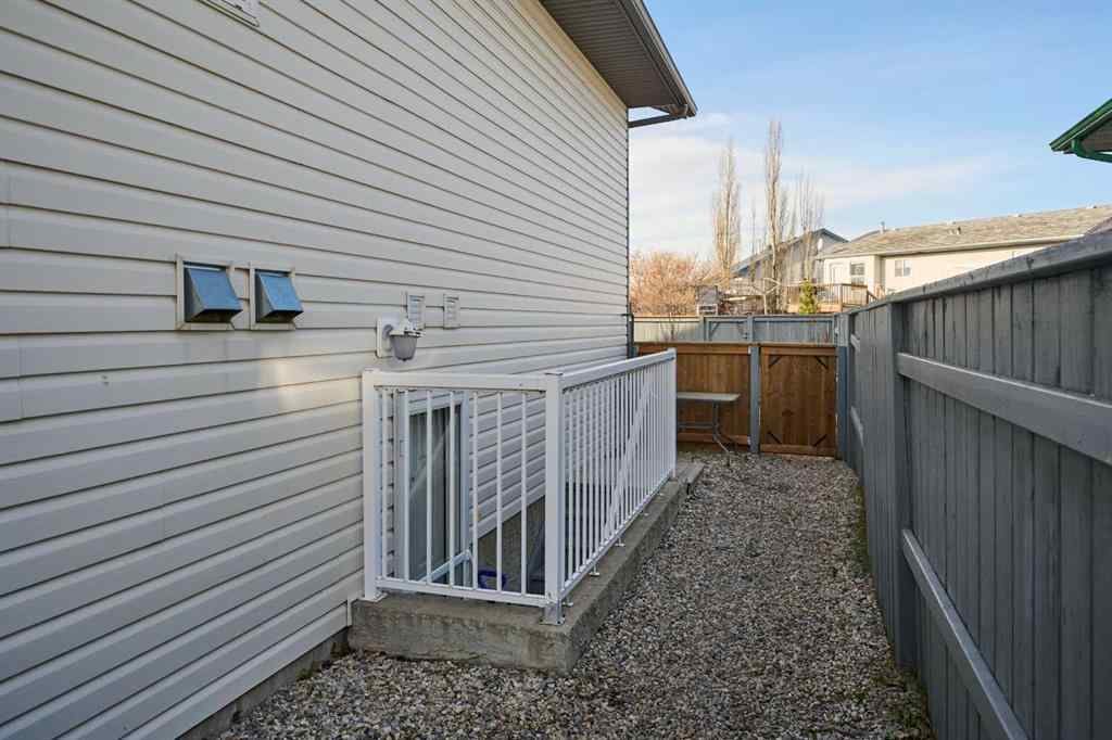MLS&reg; # A2271045 - 1409 Strathcona Way  in Strathaven Strathmore, Residential Open Houses