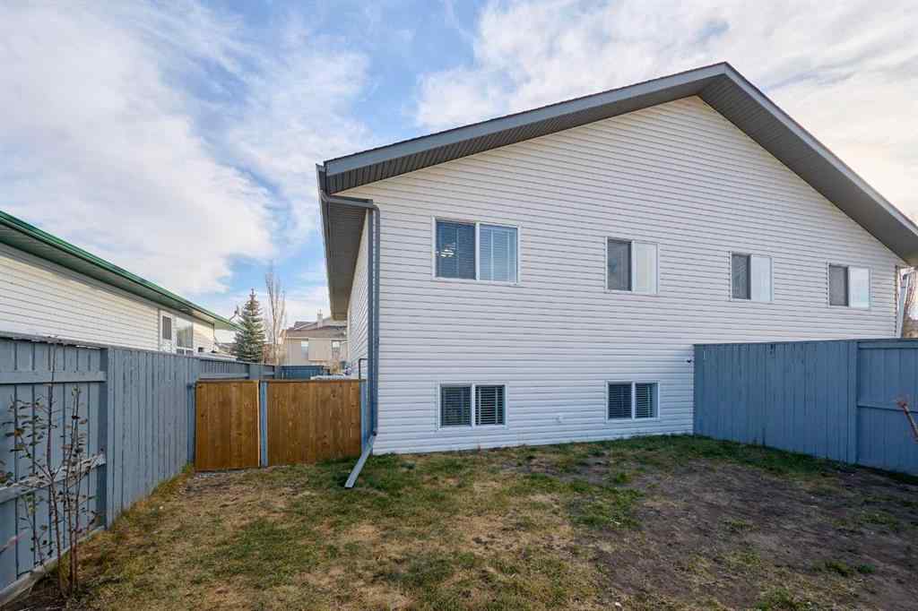 MLS&reg; # A2271045 - 1409 Strathcona Way  in Strathaven Strathmore, Residential Open Houses
