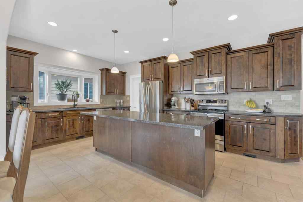 MLS&reg; # A2271054 - 65 Emily Crescent  in Elizabeth Park Lacombe, Residential Open Houses