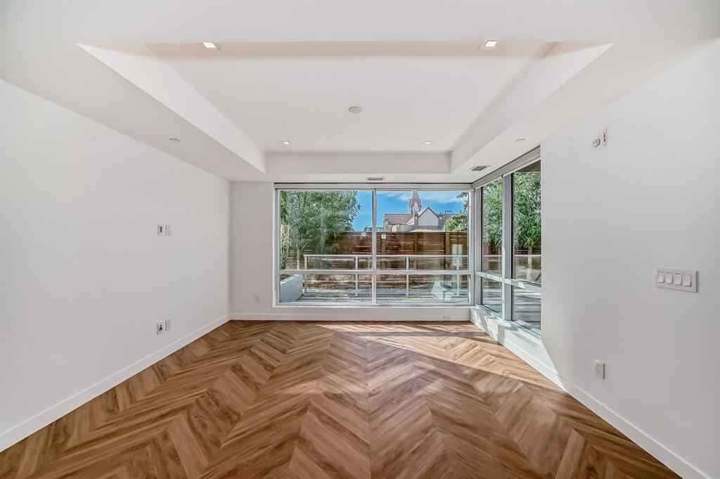 MLS® # A2271117 - Unit #112 8445 Broadcast Avenue SW in West Springs Calgary, Residential Open Houses