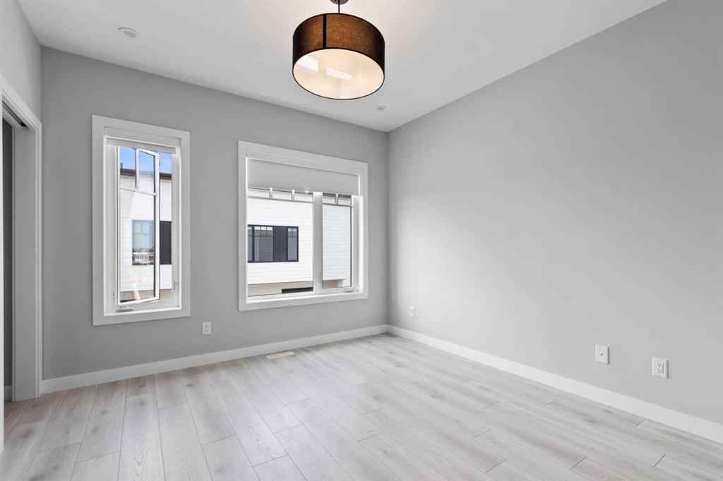 MLS&reg; # A2271128 - Unit #501 8155 8 Avenue SW in West Springs Calgary, Residential Open Houses