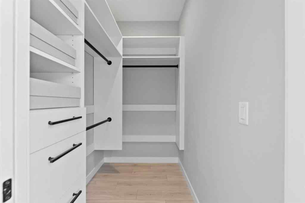 MLS&reg; # A2271128 - Unit #501 8155 8 Avenue SW in West Springs Calgary, Residential Open Houses