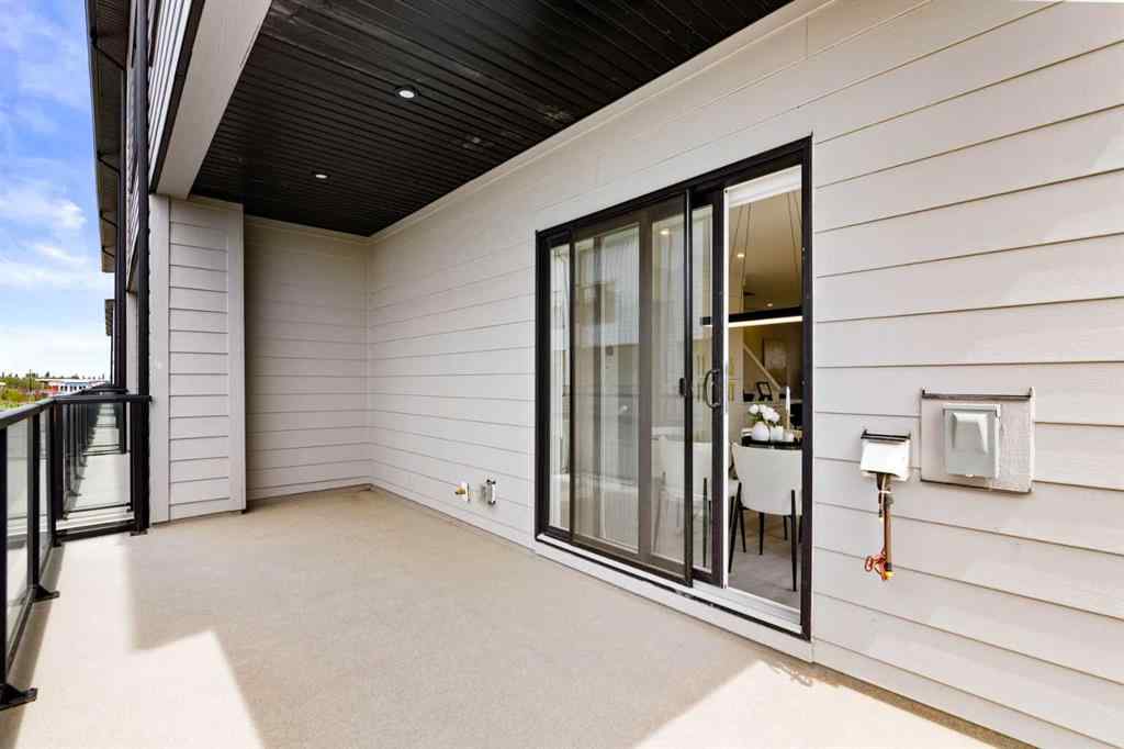 MLS&reg; # A2271128 - Unit #501 8155 8 Avenue SW in West Springs Calgary, Residential Open Houses