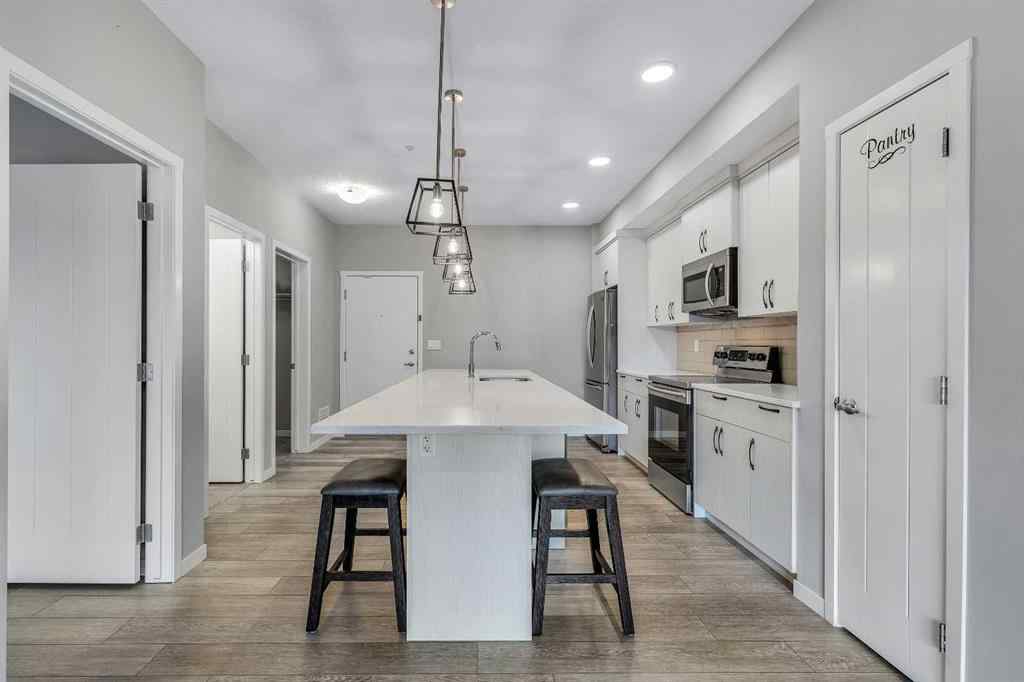 MLS® A2271172 - Unit #113 370 Harvest Hills Common NE in Harvest Hills Calgary, Residential