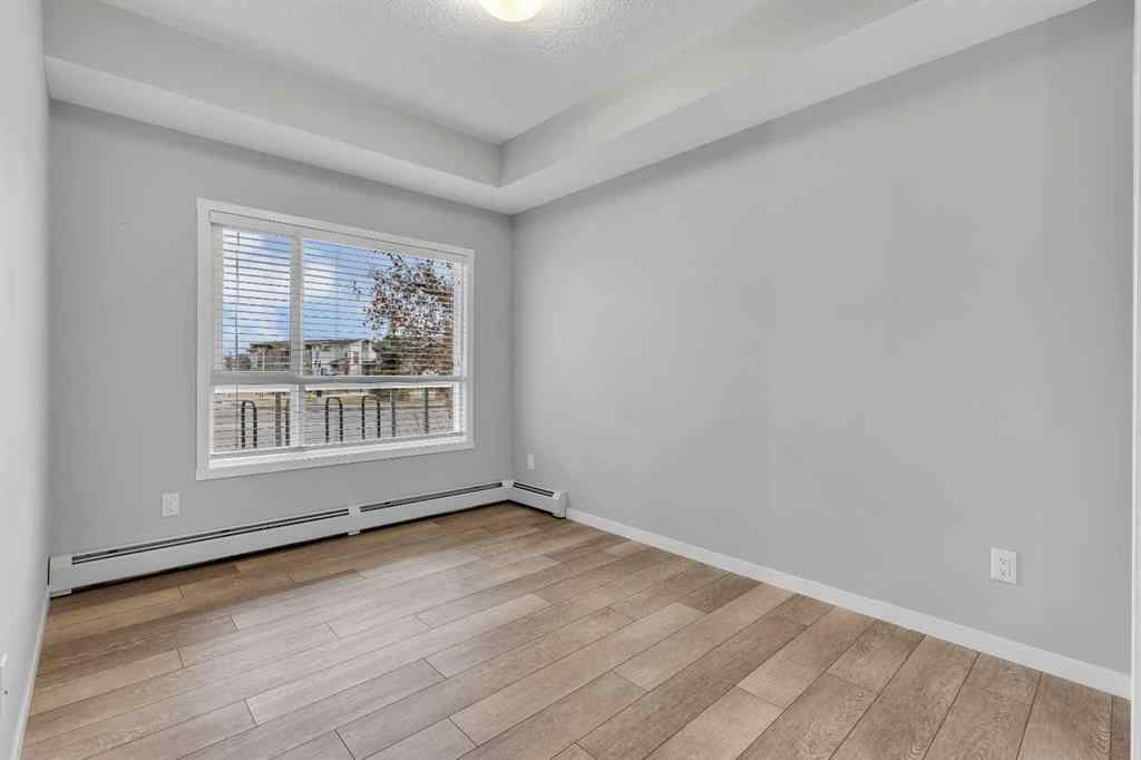 MLS® A2271172 - Unit #113 370 Harvest Hills Common NE in Harvest Hills Calgary, Residential