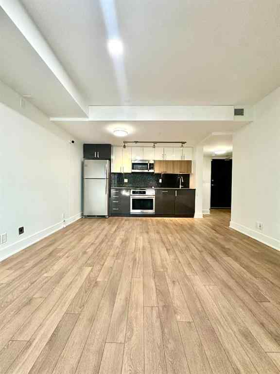 MLS&reg; # A2271175 - 607 Confluence Way SE in Downtown East Village Calgary, Commercial Open Houses