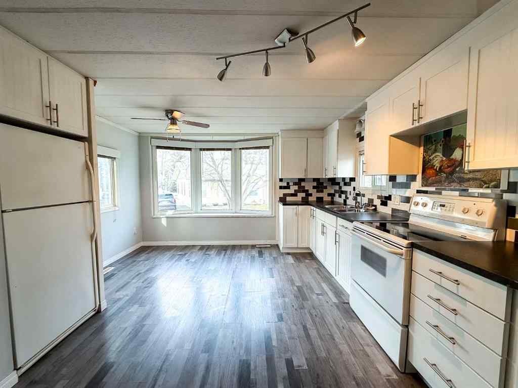 MLS&reg; # A2271187 - Unit #417 700 Carmichael Lane  in Mountain View Hinton, Mobile Open Houses