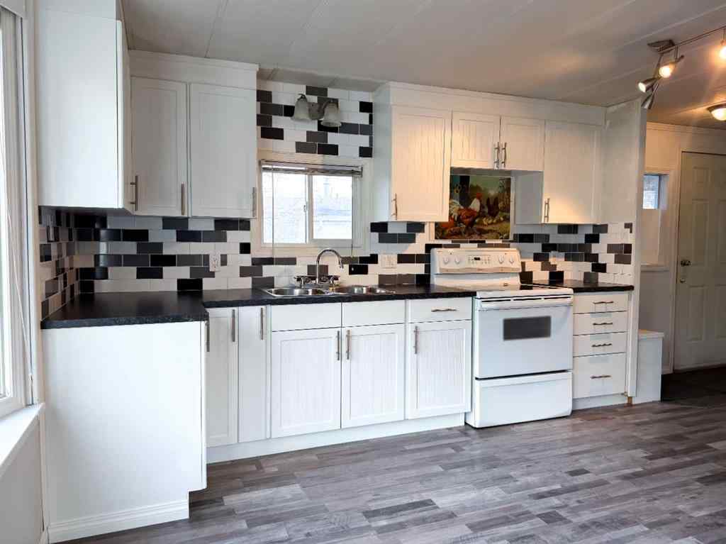 MLS&reg; # A2271187 - Unit #417 700 Carmichael Lane  in Mountain View Hinton, Mobile Open Houses