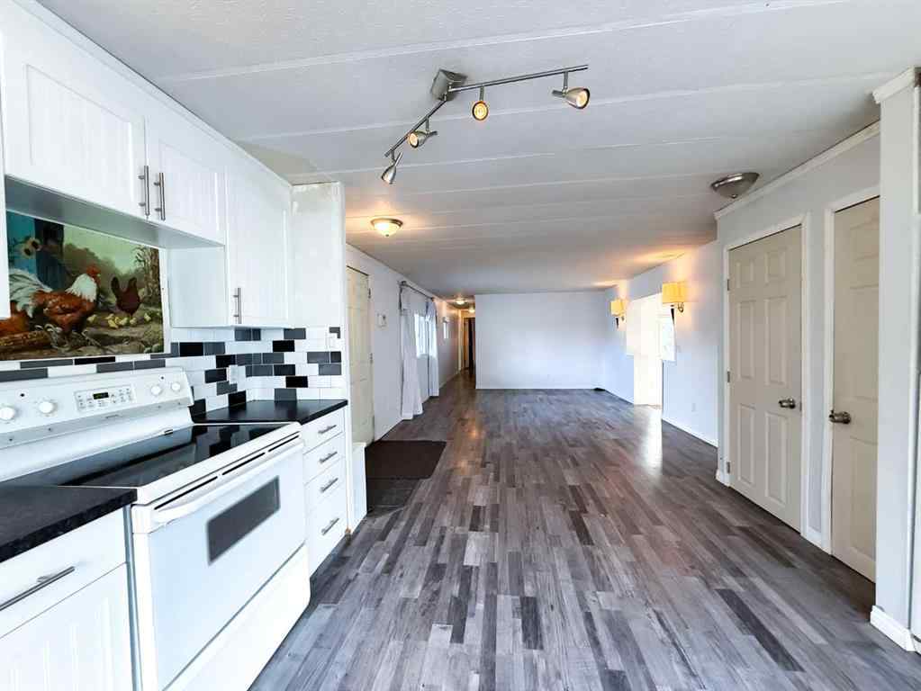 MLS&reg; # A2271187 - Unit #417 700 Carmichael Lane  in Mountain View Hinton, Mobile Open Houses