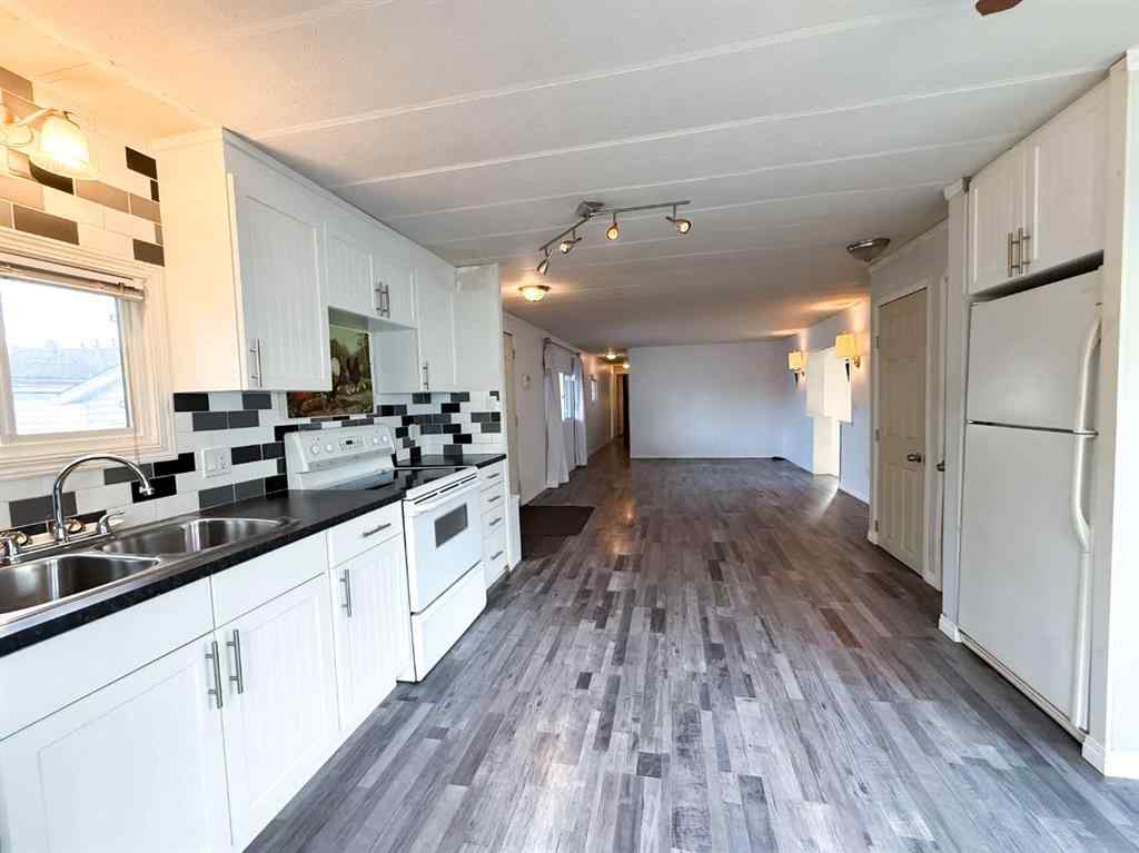 MLS&reg; # A2271187 - Unit #417 700 Carmichael Lane  in Mountain View Hinton, Mobile Open Houses