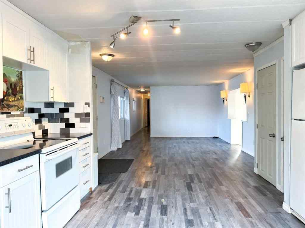 MLS&reg; # A2271187 - Unit #417 700 Carmichael Lane  in Mountain View Hinton, Mobile Open Houses