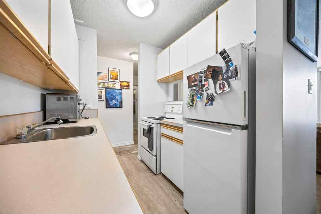 MLS&reg; # A2271213 - Unit #438 1421 7 Avenue NW in Hillhurst Calgary, Residential Open Houses