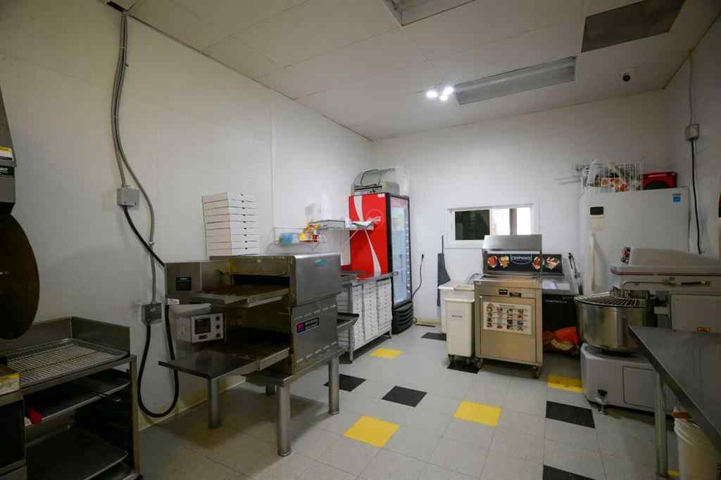 MLS&reg; # A2271214 - 205 3 Avenue  in Downtown Cochrane, Commercial Open Houses