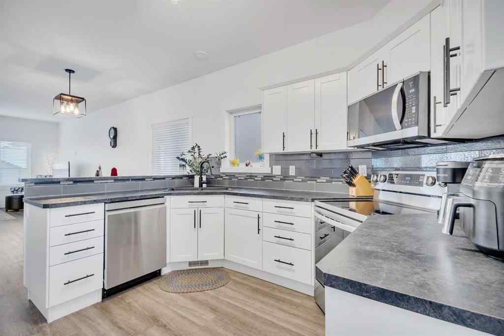 MLS&reg; # A2271227 - 98 Village Crescent  in Vanier East Red Deer, Residential Open Houses