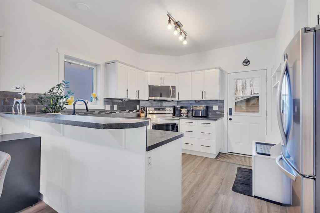 MLS&reg; # A2271227 - 98 Village Crescent  in Vanier East Red Deer, Residential Open Houses