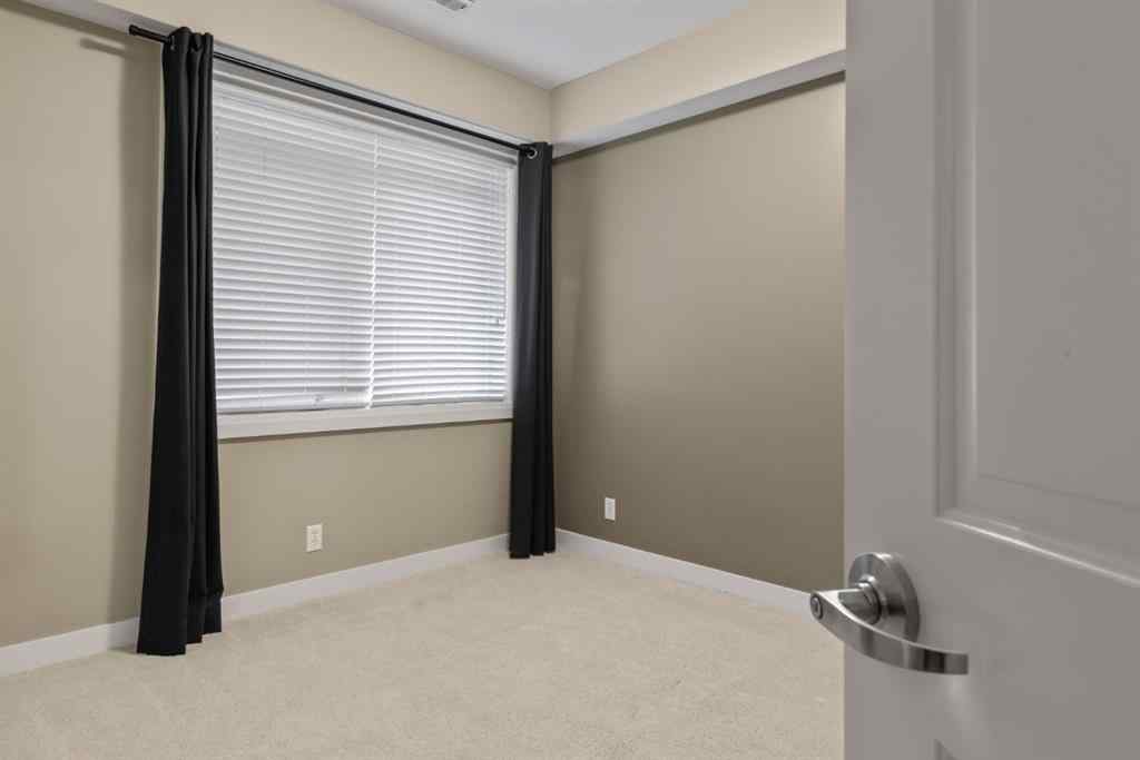 MLS® # A2271234 - Unit #402 476 14 Street NW in Hillhurst Calgary, Residential Open Houses