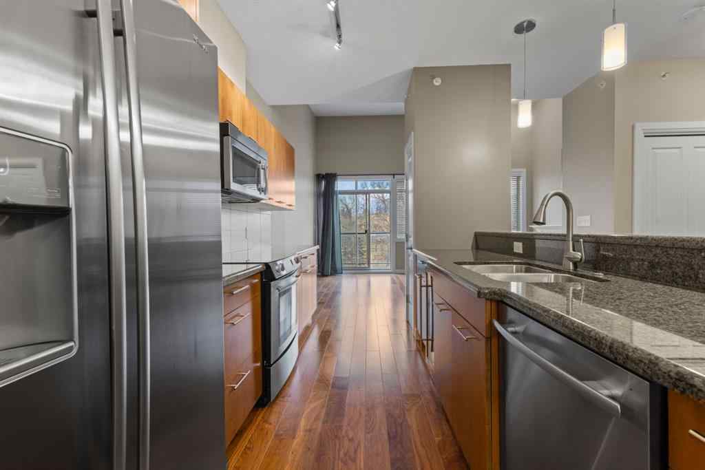 MLS® # A2271234 - Unit #402 476 14 Street NW in Hillhurst Calgary, Residential Open Houses