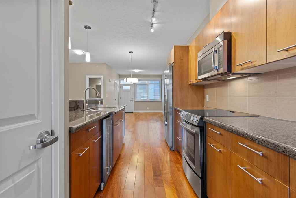 MLS® # A2271234 - Unit #402 476 14 Street NW in Hillhurst Calgary, Residential Open Houses