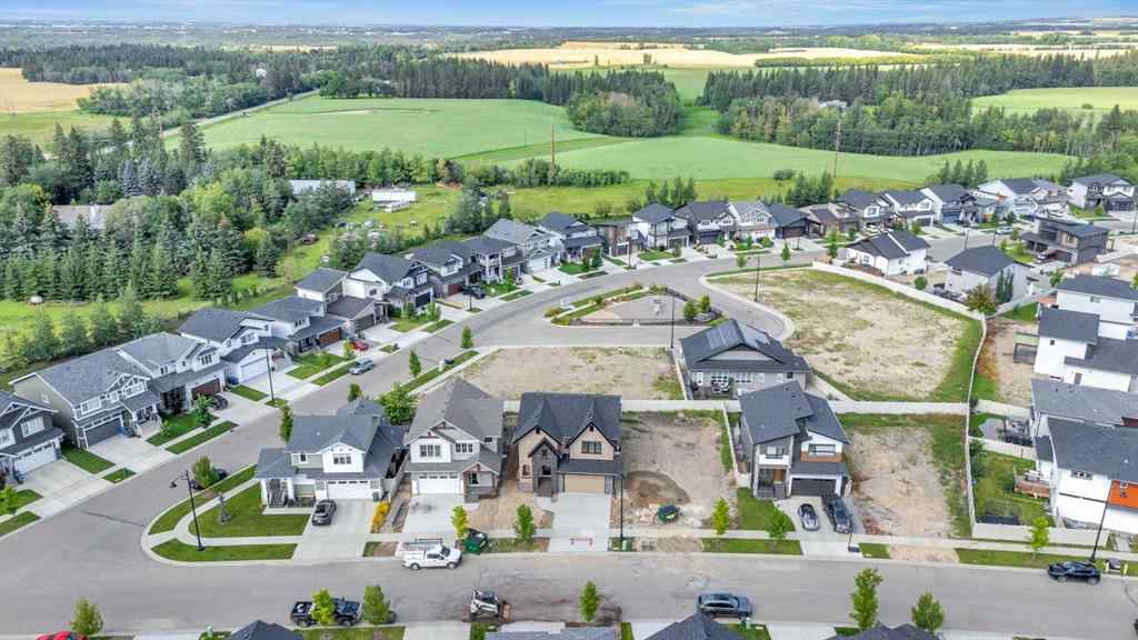 MLS&reg; # A2271239 - 20 Eaton Crescent  in Evergreen Red Deer, Residential Open Houses