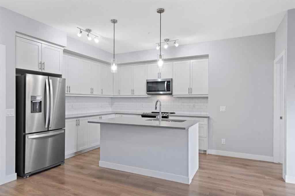 MLS&reg; # A2271297 - Unit #308 100 Auburn Meadows Manor SE in Auburn Bay Calgary, Residential Open Houses