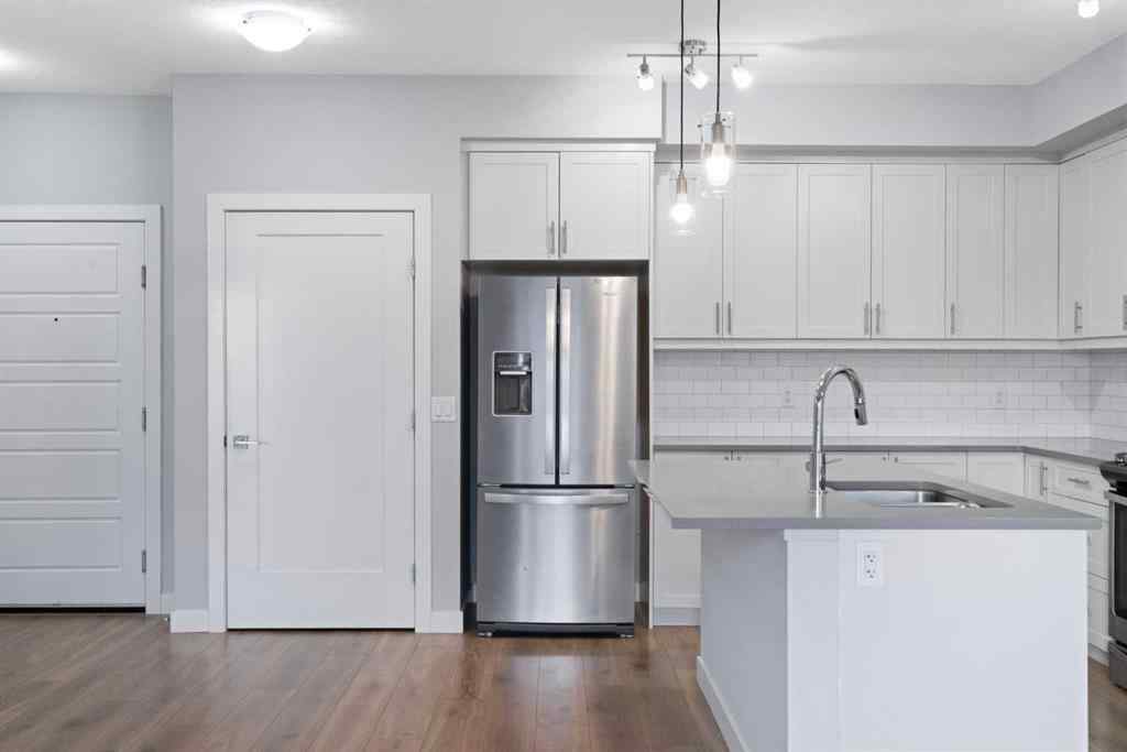 MLS&reg; # A2271297 - Unit #308 100 Auburn Meadows Manor SE in Auburn Bay Calgary, Residential Open Houses