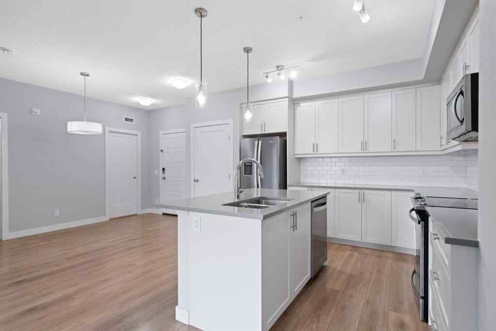 MLS&reg; # A2271297 - Unit #308 100 Auburn Meadows Manor SE in Auburn Bay Calgary, Residential Open Houses