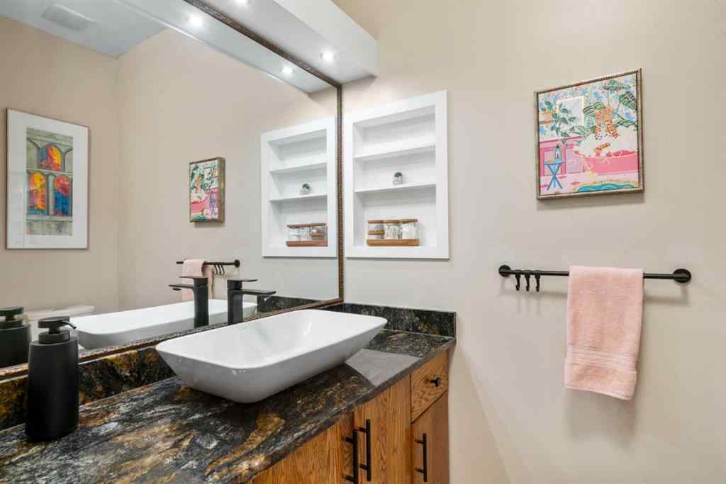 MLS&reg; # A2271308 - 110 Somme Boulevard SW in Garrison Woods Calgary, Residential Open Houses