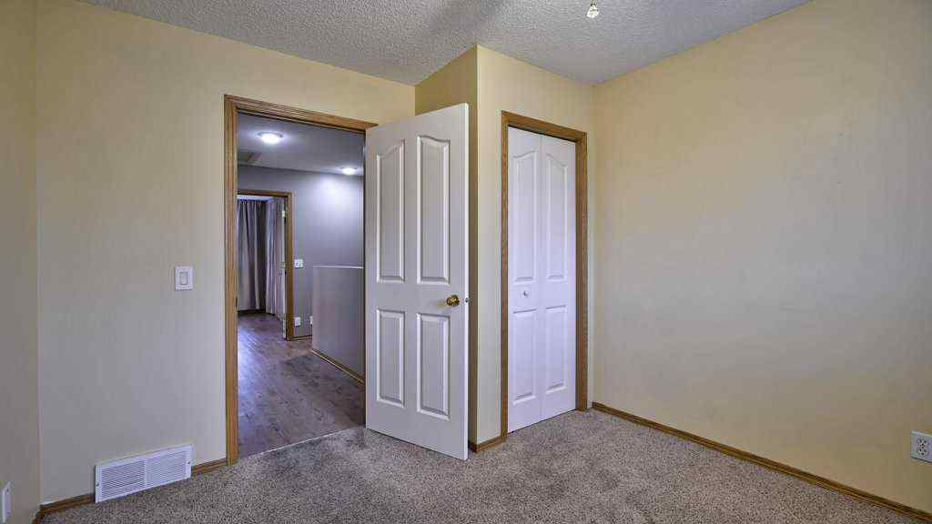 MLS® # A2271309 - 32 Mt Aberdeen Manor SE in McKenzie Lake Calgary, Residential Open Houses