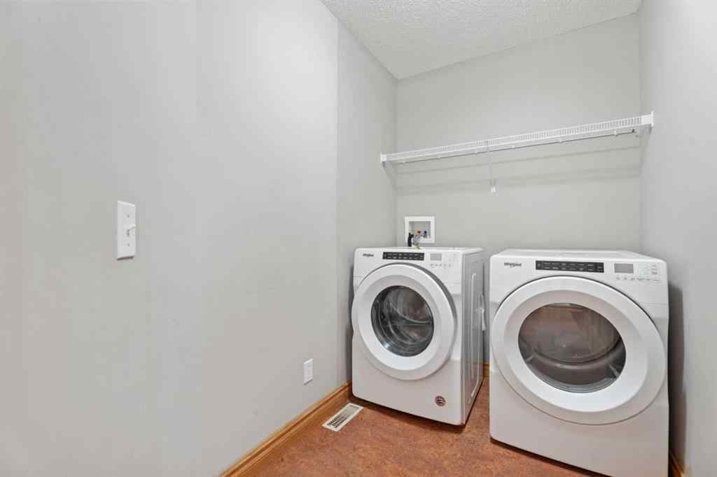 MLS&reg; # A2271327 - 303 Drake Landing Close  in Drake Landing Okotoks, Residential Open Houses