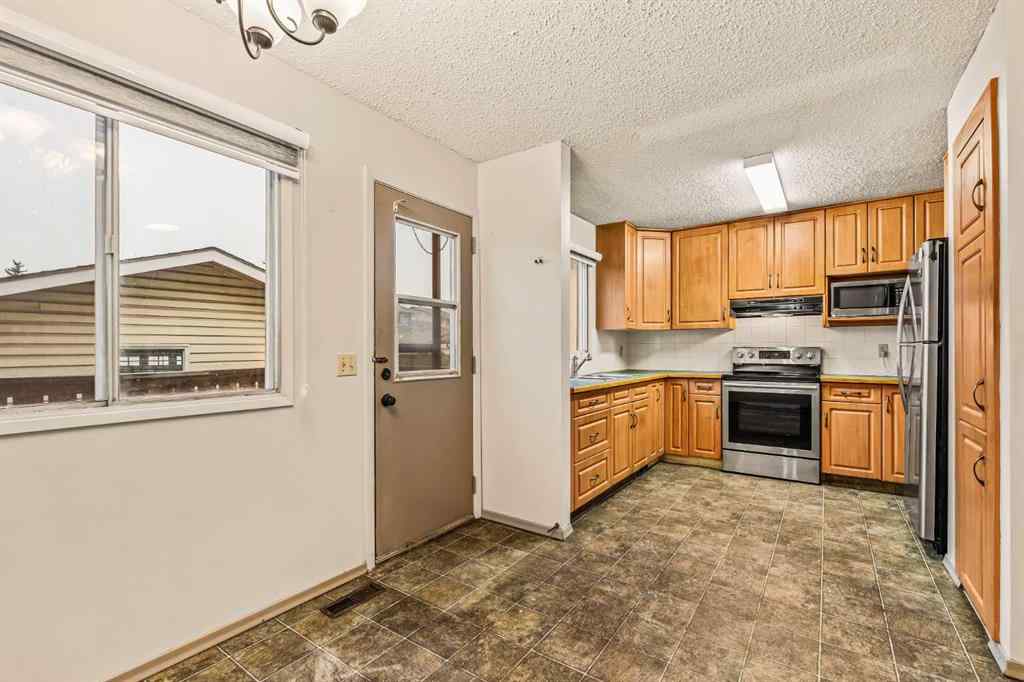 MLS&reg; # A2271346 - 4716B 44 Avenue NE in Whitehorn Calgary, Residential Open Houses