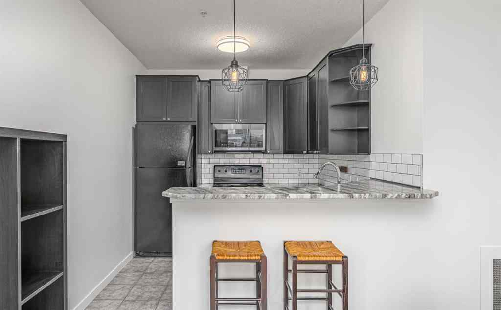 MLS&reg; # A2271382 - Unit #311 1540 17 Avenue SW in Sunalta Calgary, Residential Open Houses