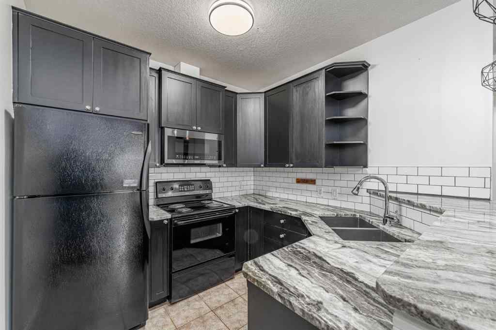 MLS&reg; # A2271382 - Unit #311 1540 17 Avenue SW in Sunalta Calgary, Residential Open Houses