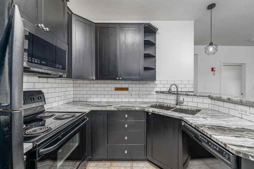 MLS&reg; # A2271382 - Unit #311 1540 17 Avenue SW in Sunalta Calgary, Residential Open Houses