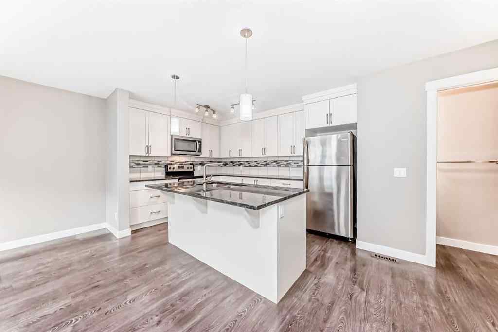 MLS&reg; # A2271465 - 704 Evanston Manor NW in Evanston Calgary, Residential Open Houses