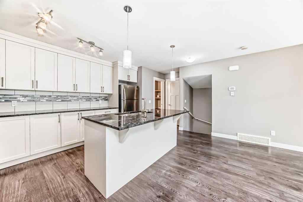MLS&reg; # A2271465 - 704 Evanston Manor NW in Evanston Calgary, Residential Open Houses
