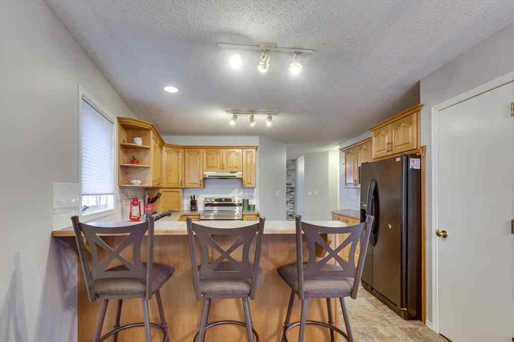MLS&reg; # A2271490 - 14 Lawrence Crescent  in Lancaster Meadows Red Deer, Residential Open Houses