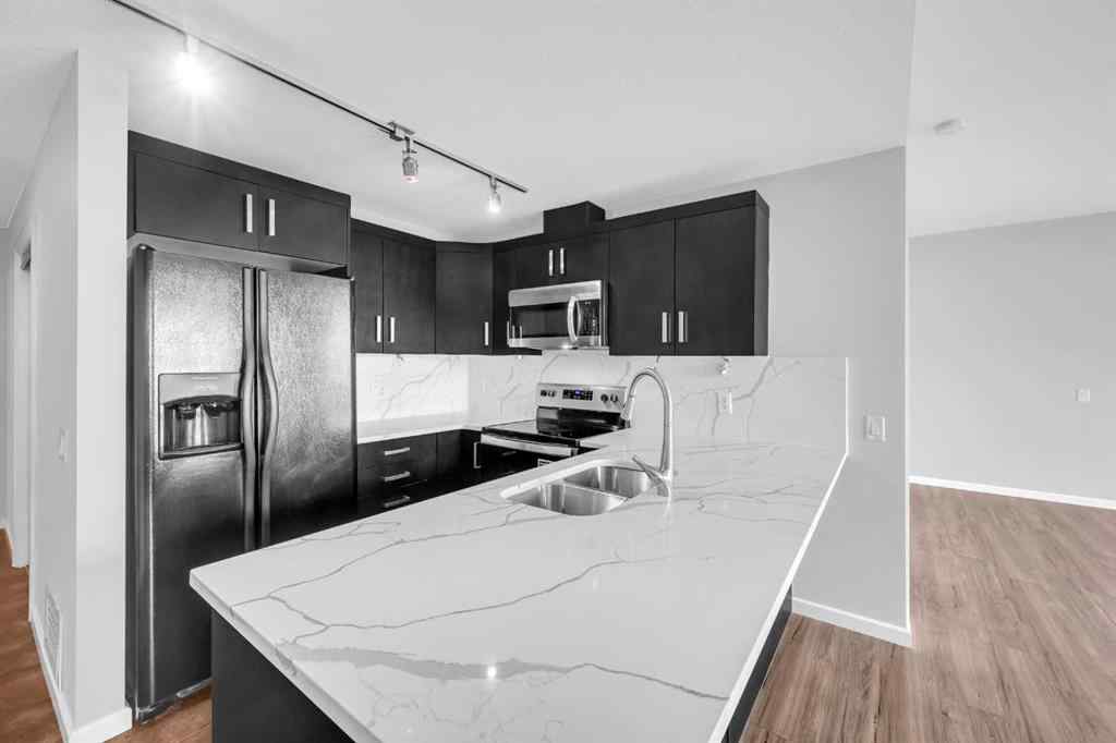 MLS&reg; # A2271497 - Unit #1405 1410 1 Street SE in Beltline Calgary, Residential Open Houses