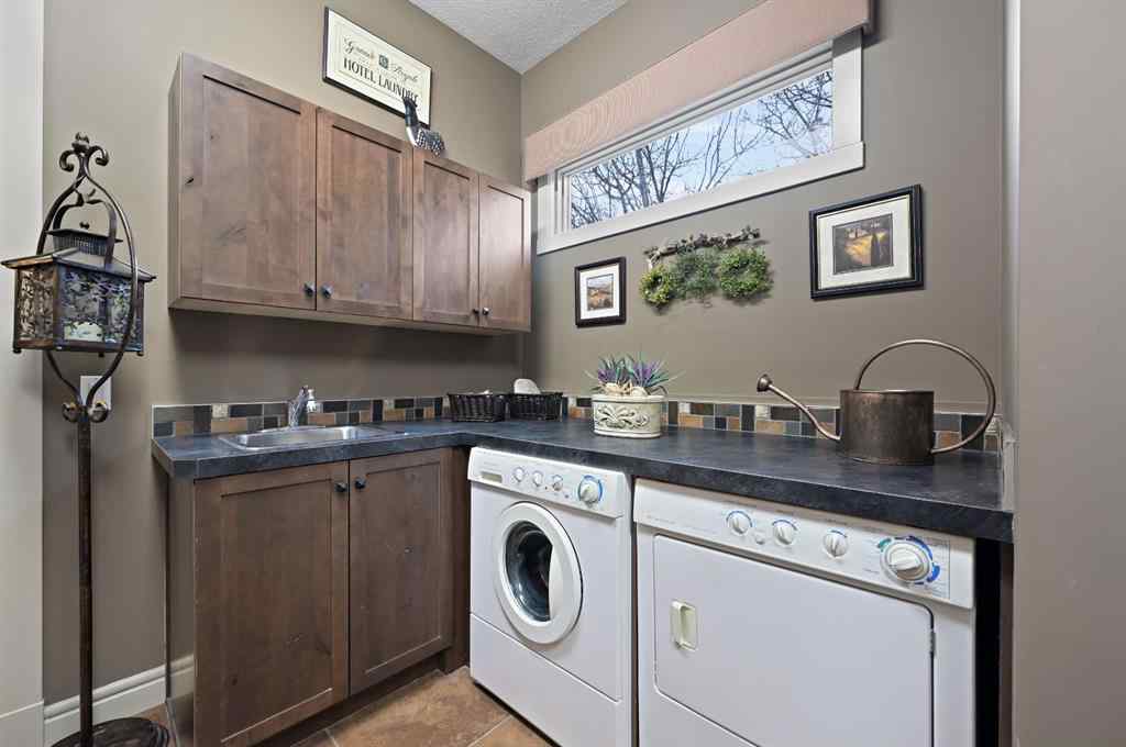 MLS&reg; # A2271500 - 37 Hawk's Landing Drive  in Hawks Landing Priddis Greens, Residential Open Houses