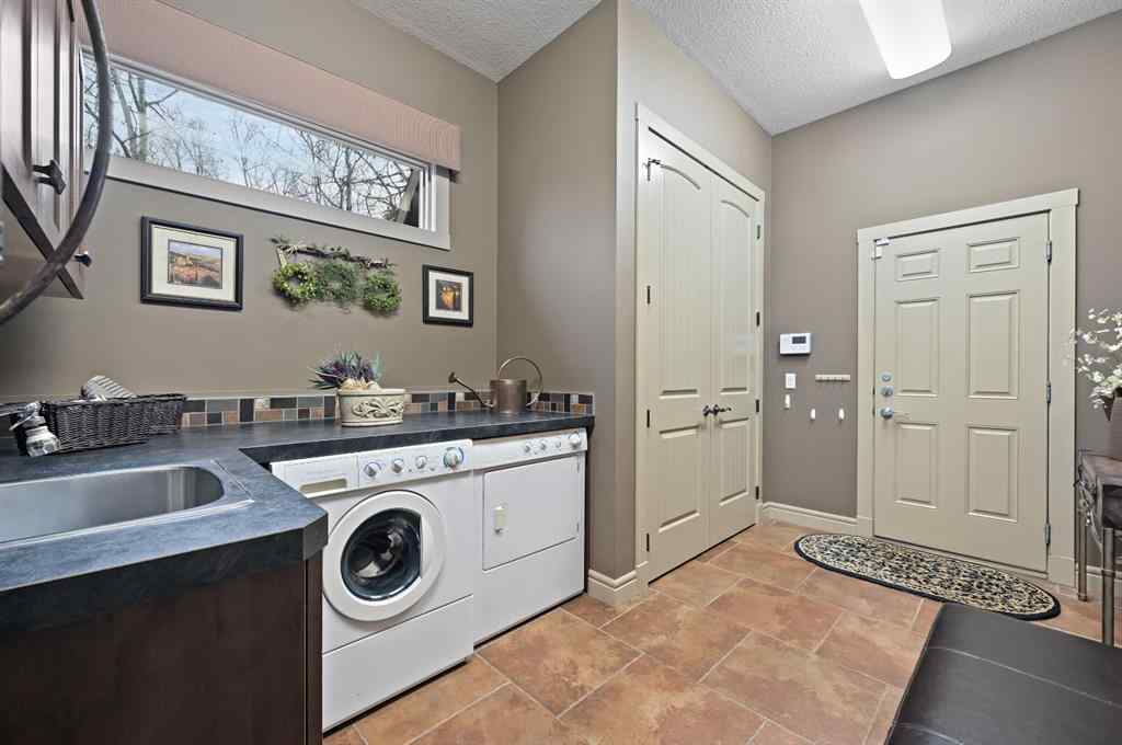 MLS&reg; # A2271500 - 37 Hawk's Landing Drive  in Hawks Landing Priddis Greens, Residential Open Houses