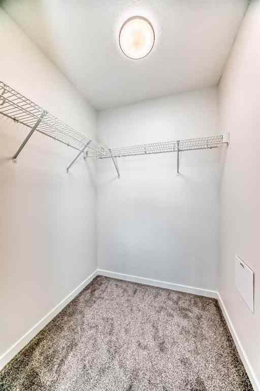 MLS&reg; # A2271521 - Unit #212 245 Edith Place NW in Glacier Ridge Calgary, Residential Open Houses