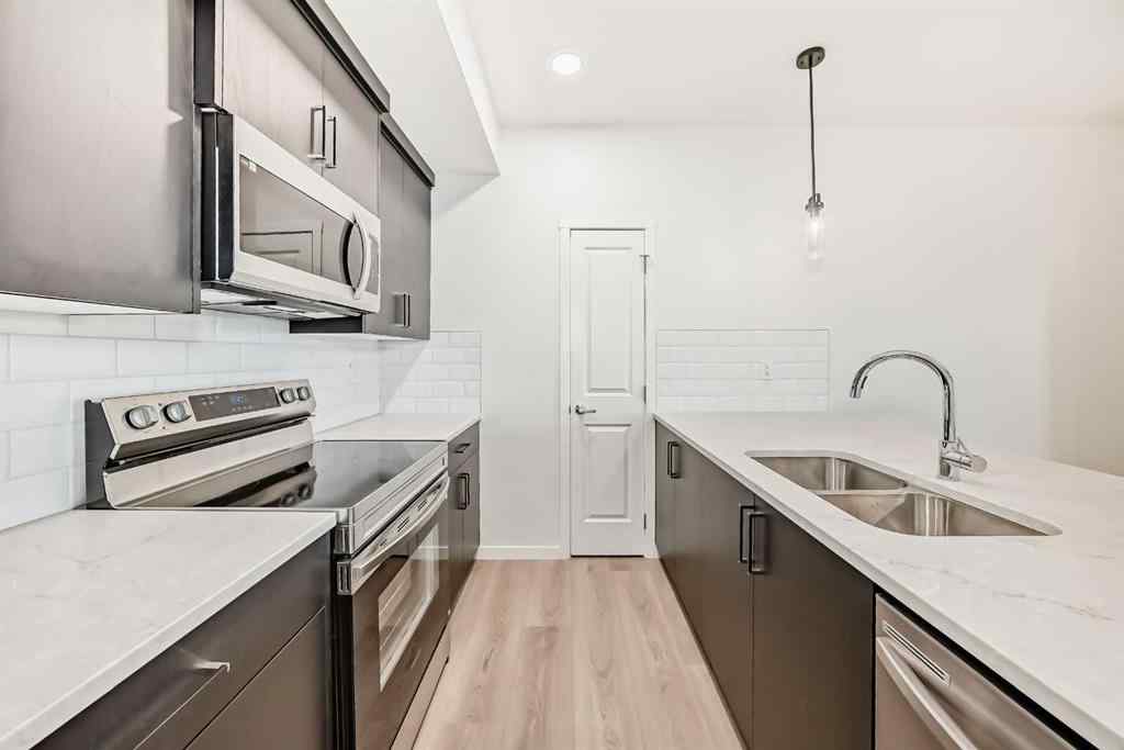 MLS&reg; # A2271521 - Unit #212 245 Edith Place NW in Glacier Ridge Calgary, Residential Open Houses