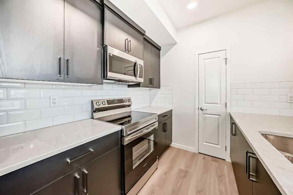 MLS&reg; # A2271521 - Unit #212 245 Edith Place NW in Glacier Ridge Calgary, Residential Open Houses