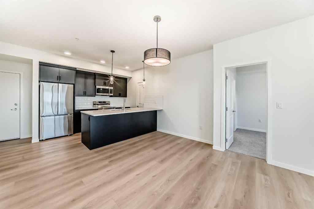 MLS&reg; # A2271521 - Unit #212 245 Edith Place NW in Glacier Ridge Calgary, Residential Open Houses