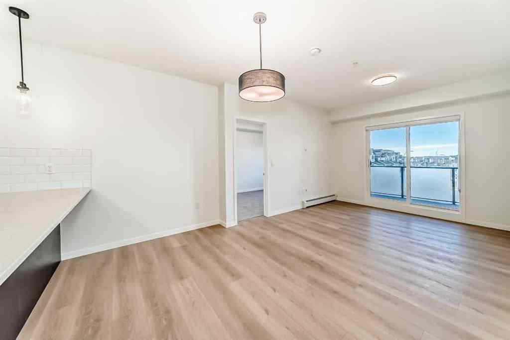 MLS&reg; # A2271521 - Unit #212 245 Edith Place NW in Glacier Ridge Calgary, Residential Open Houses