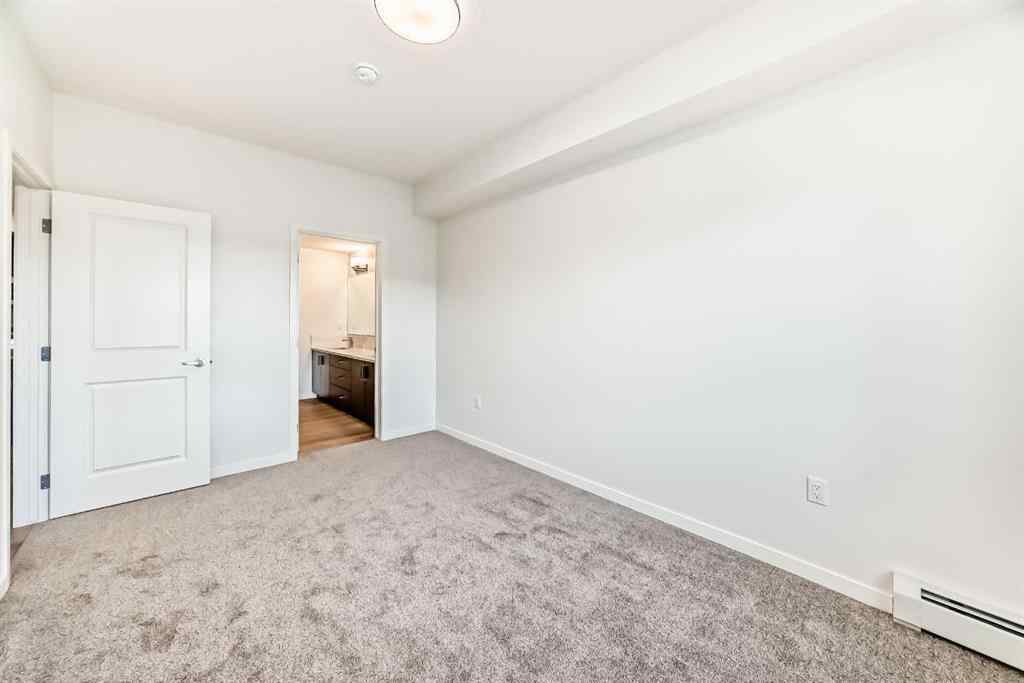 MLS&reg; # A2271521 - Unit #212 245 Edith Place NW in Glacier Ridge Calgary, Residential Open Houses