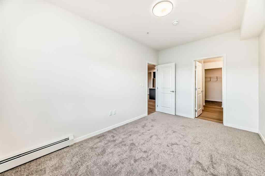 MLS&reg; # A2271521 - Unit #212 245 Edith Place NW in Glacier Ridge Calgary, Residential Open Houses