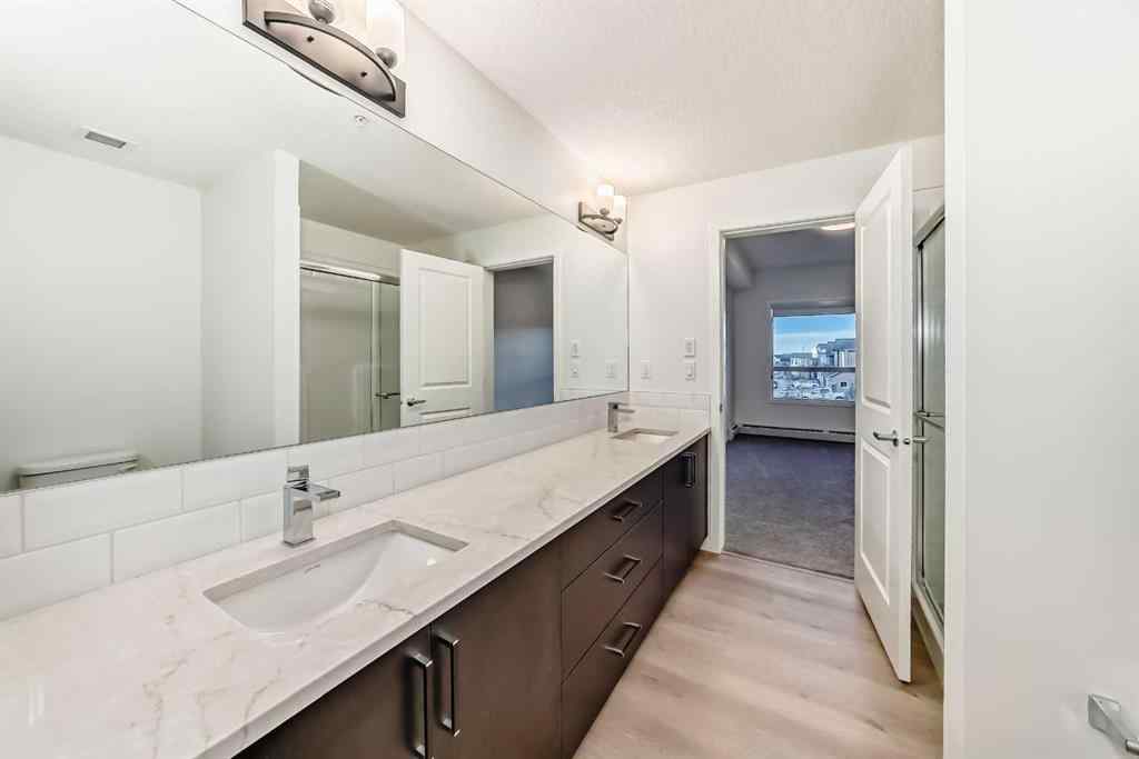 MLS&reg; # A2271521 - Unit #212 245 Edith Place NW in Glacier Ridge Calgary, Residential Open Houses