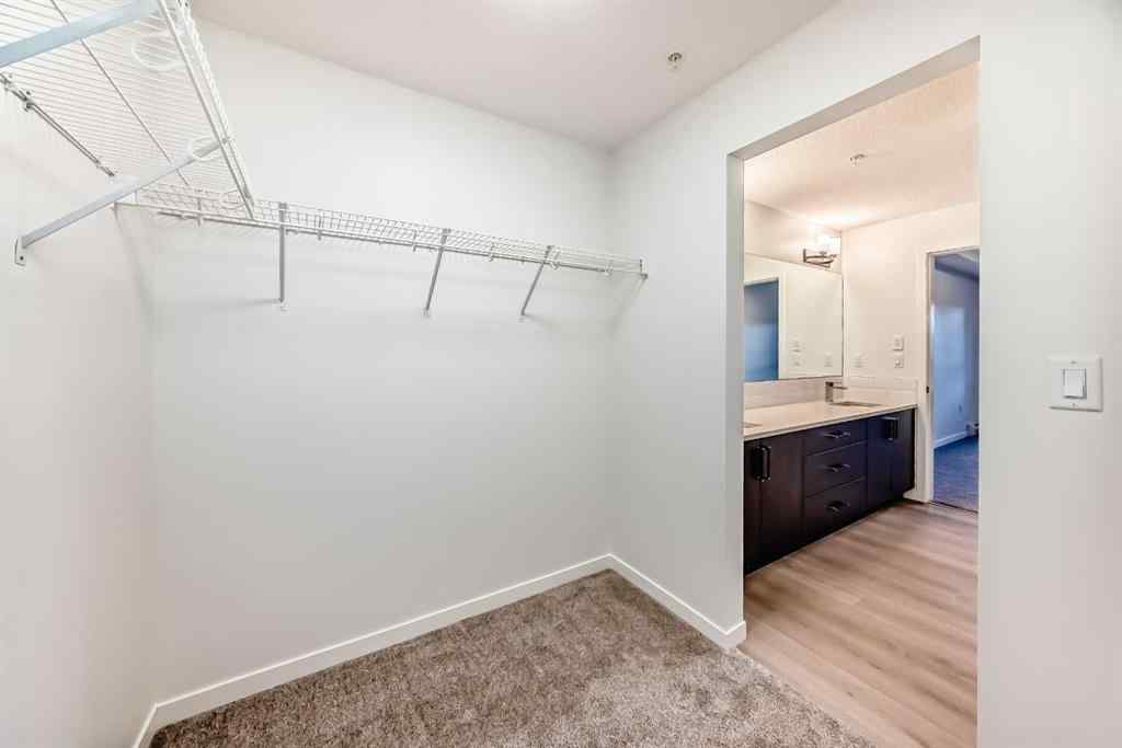 MLS&reg; # A2271521 - Unit #212 245 Edith Place NW in Glacier Ridge Calgary, Residential Open Houses